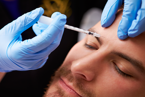 Botox injection in the forehead | Harley Street Dermatology Clinic